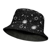 Unisex goth bucket hat showing sun, moon and star patterns - side angle